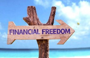 Financial freedom sign on beach