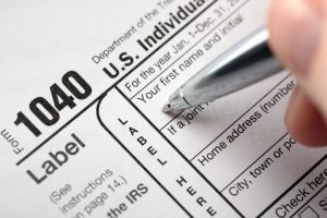 US tax form 1040 being filled out 